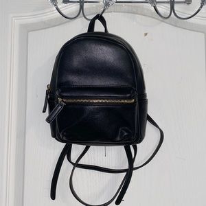 Mini black backpack
